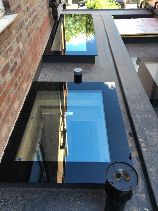 Multiple flat roof skylights on extension in Manor Park